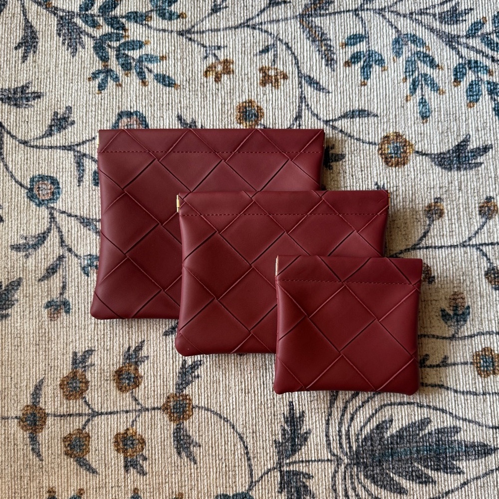 New! Set of three burgundy woven pouches